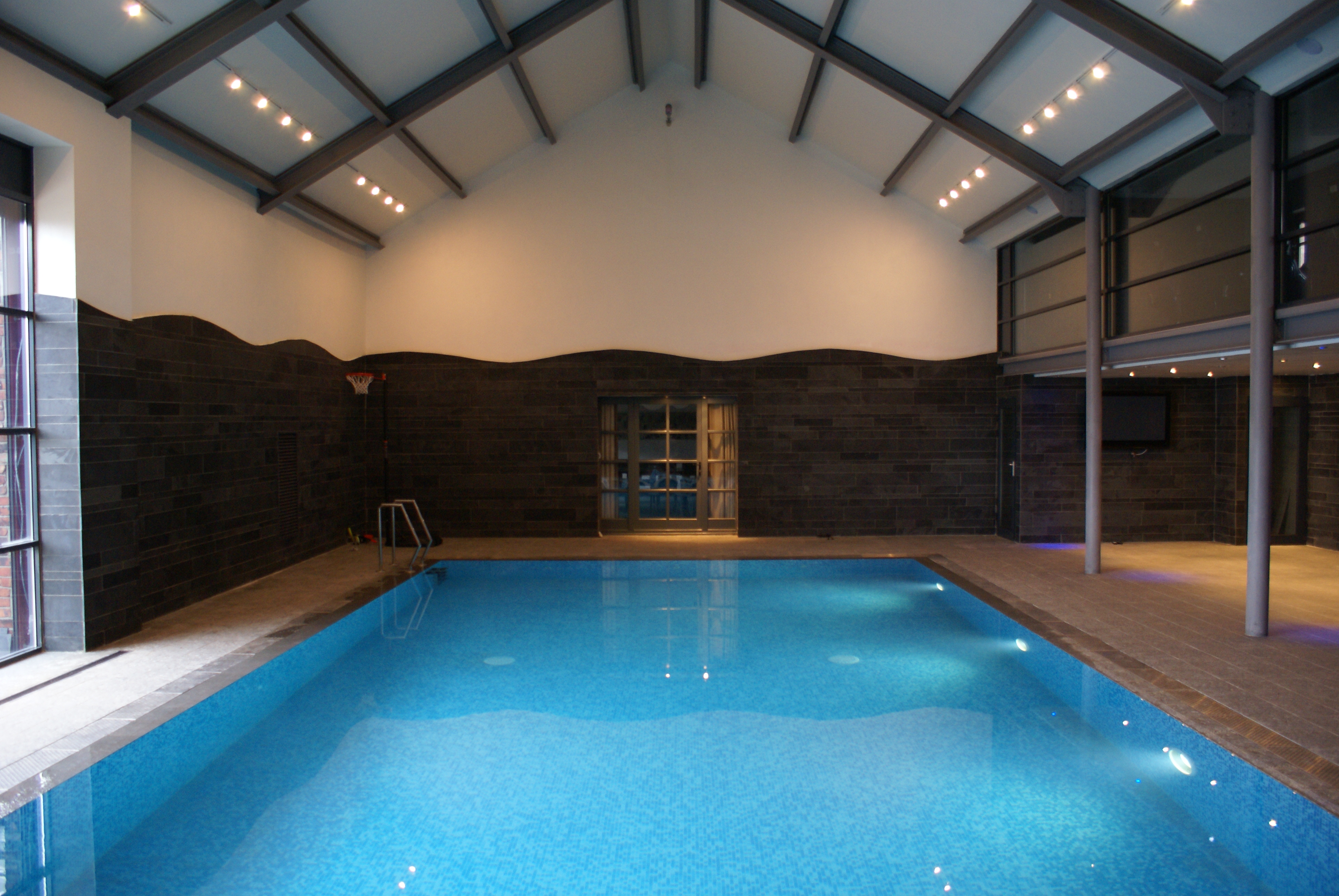 Deck-level-indoor-tiled-pool-delta-del-marquis-spa (1).JPG